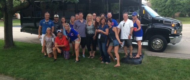 ColinKurtis employees in front of bus